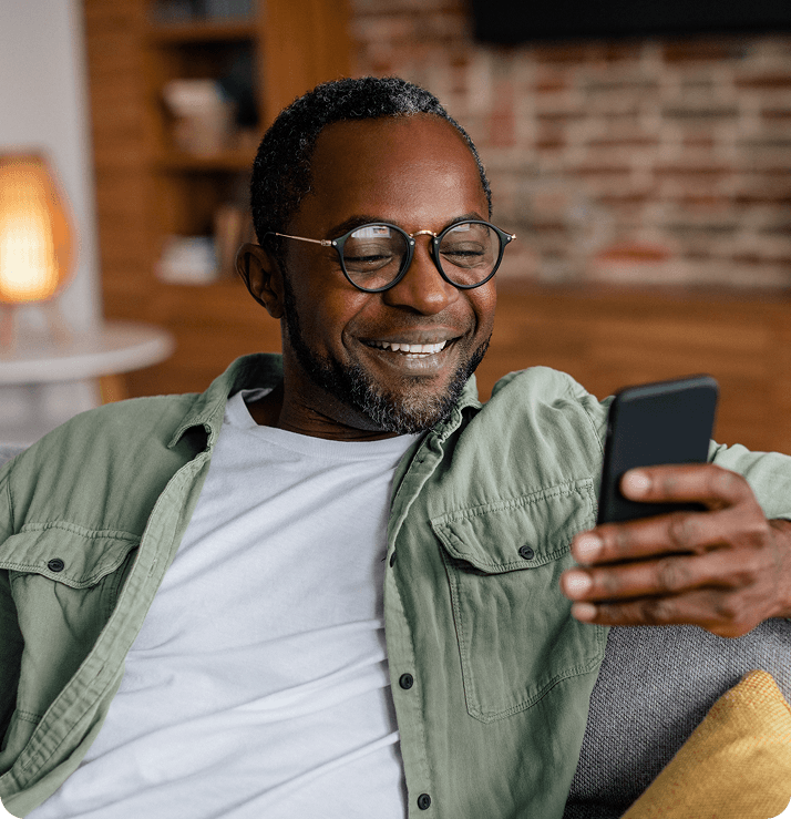 Happy landlord using phone